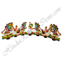 A colorful hand-painted wooden Hindu deity and dancing figures display, featuring Lord Krishna and other traditional figures on a decorated base, shown against a plain white background with a watermark.