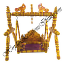 Decorative wooden swing with intricate designs on a white background