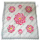 White fabric with pink floral patterns and decorative border