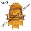 A wooden sinhasan and Khandpath and Choki set, with intricate carvings and a glossy finish, typically used for home seva purposes.