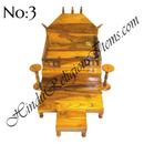 A wooden sinhasan and Khandpath and Choki set, with intricate carvings and a glossy finish, typically used for home seva purposes.