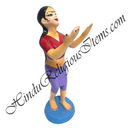 A fiber swarup statue of Gopi from Hindu mythology, painted in red and blue, with Fix hands, displayed on a platform.